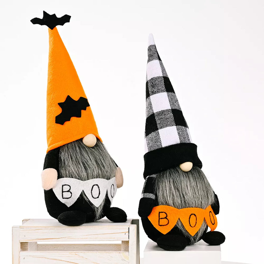 decorative figurine in black with plaid and conical hat