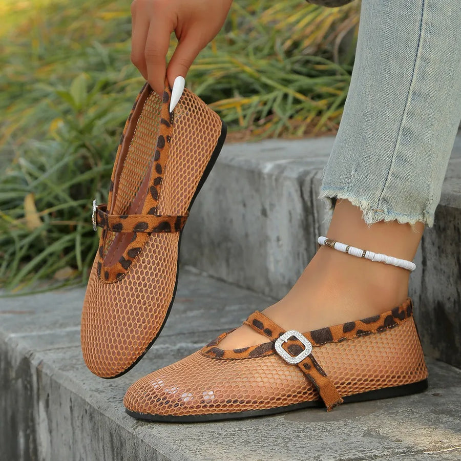 Mesh ballet flats in leopard print with buckle detail and a sheer mesh overlay.