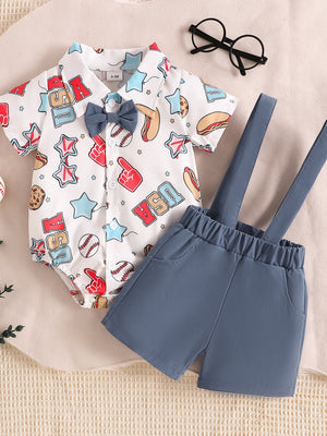 White USA print short sleeve bodysuit with blue suspender shorts.