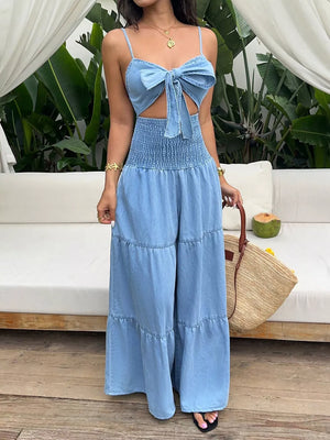 85% cotton, 15% polyester Care instructions: Machine wash cold jumpsuit in Blue with flared silhouette
