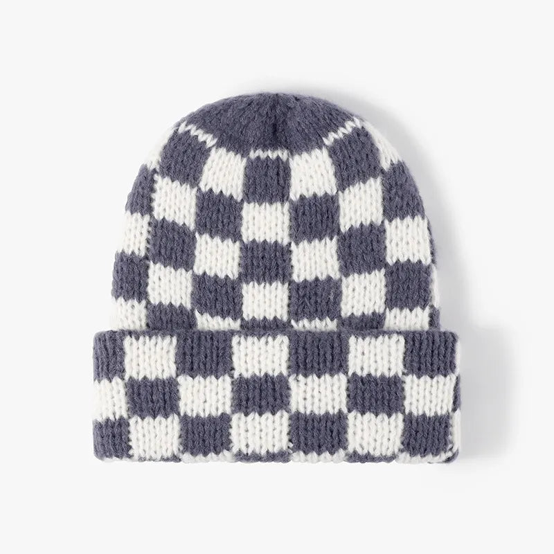 Checkerboard knit beanie in grey and white with a cuffed brim.