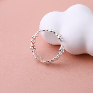 ring in silver with floral and adjustable
