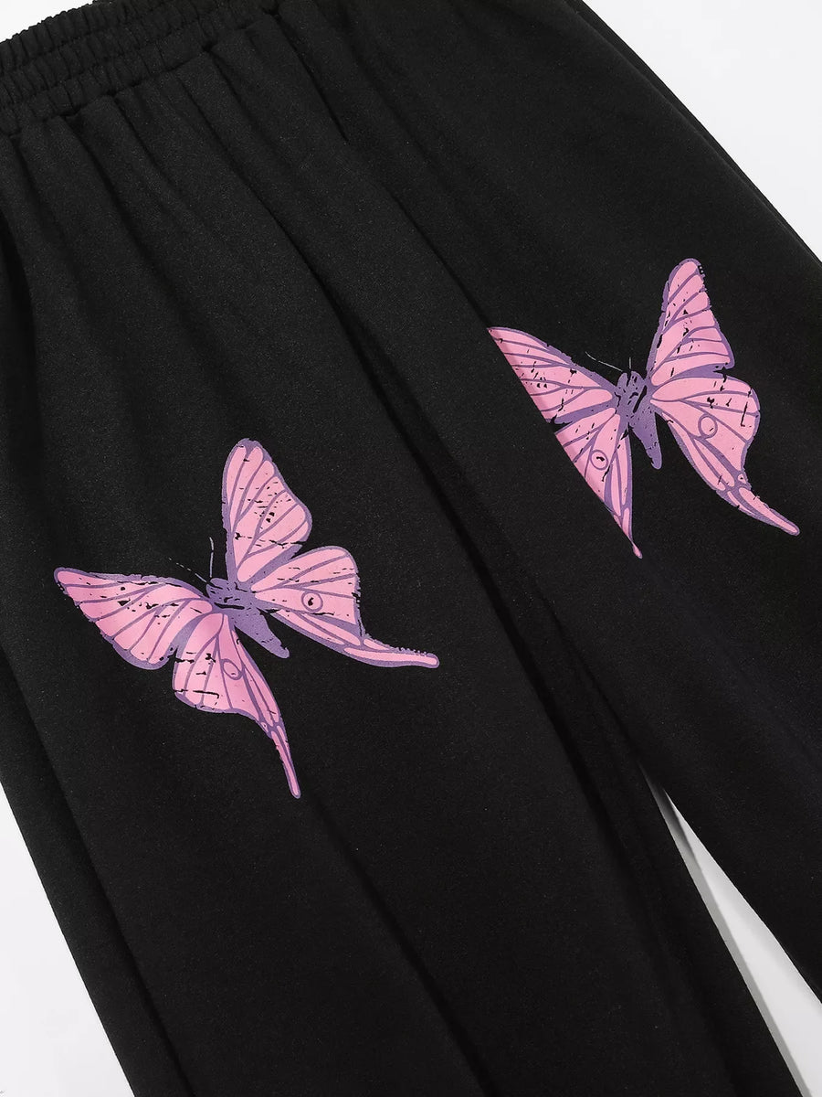 Black sweatpants with pink butterfly graphic detail
