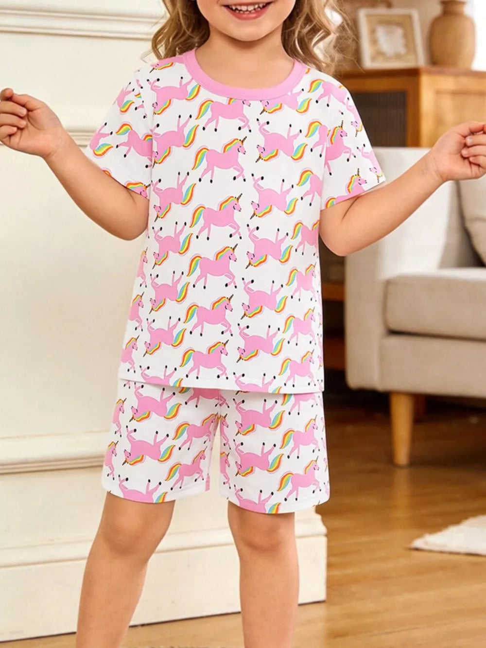 Girls' white unicorn print tee and shorts set with pink trim