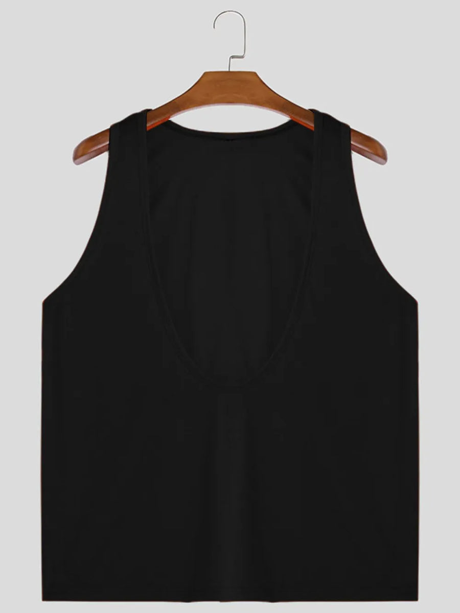 Black deep plunge tank top with wide straps and a U-neckline.