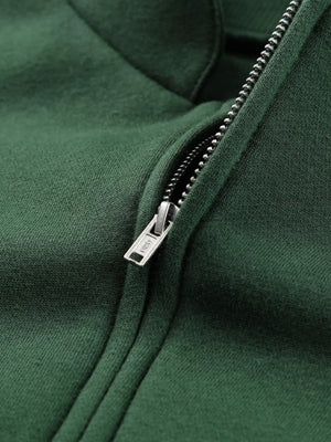 Half zip stand collar sweatshirt in dark green with a silver zipper detail.