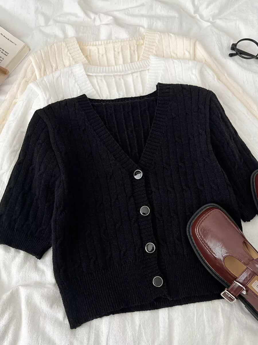 Black cable-knit cropped cardigan with V-neck and buttons, short sleeves