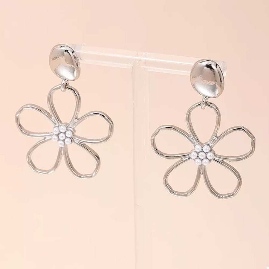 earrings in silver with floral and drop design