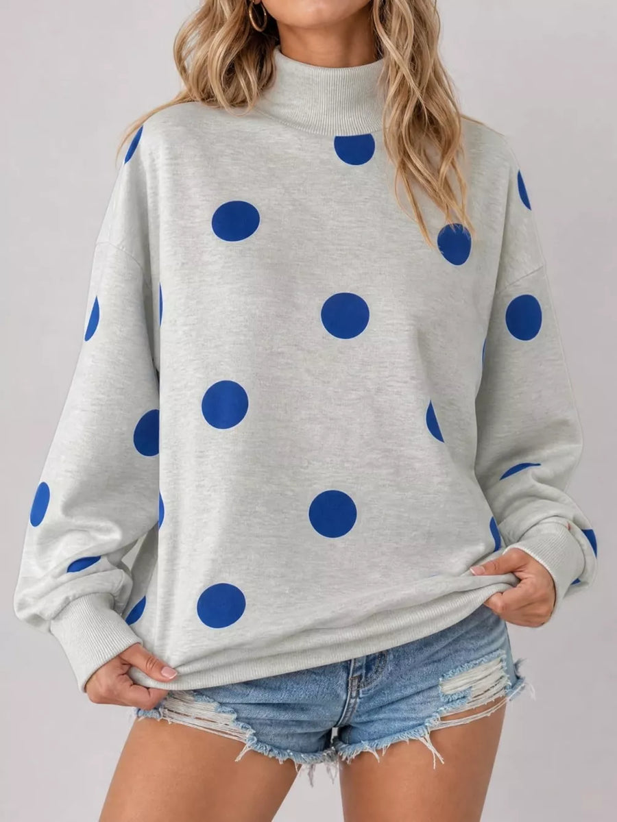 royal blue sweatshirt featuring stretch and polka dot