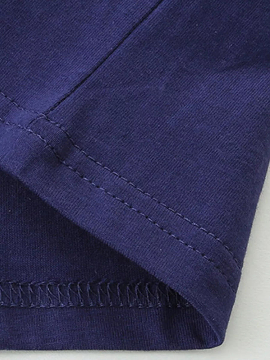 Toddler navy blue cotton crew neck t-shirt detail showing stitching.