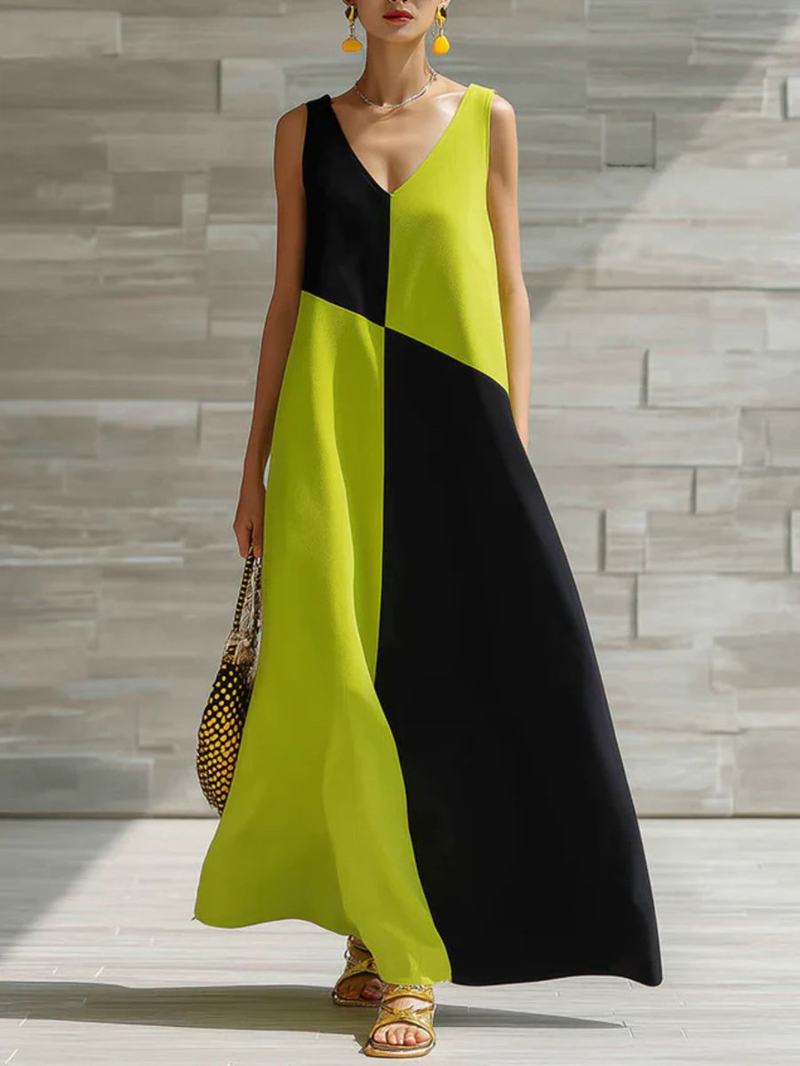 Geometric V-neck maxi dress in lime and black colorblock, sleeveless, flowy maxi skirt.