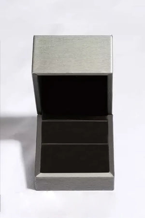 Silver moissanite halo drop earrings box with open lid