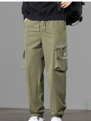 95%polyester,5%spandex Care instructions: Machine wash cold joggers in tan with tapered silhouette