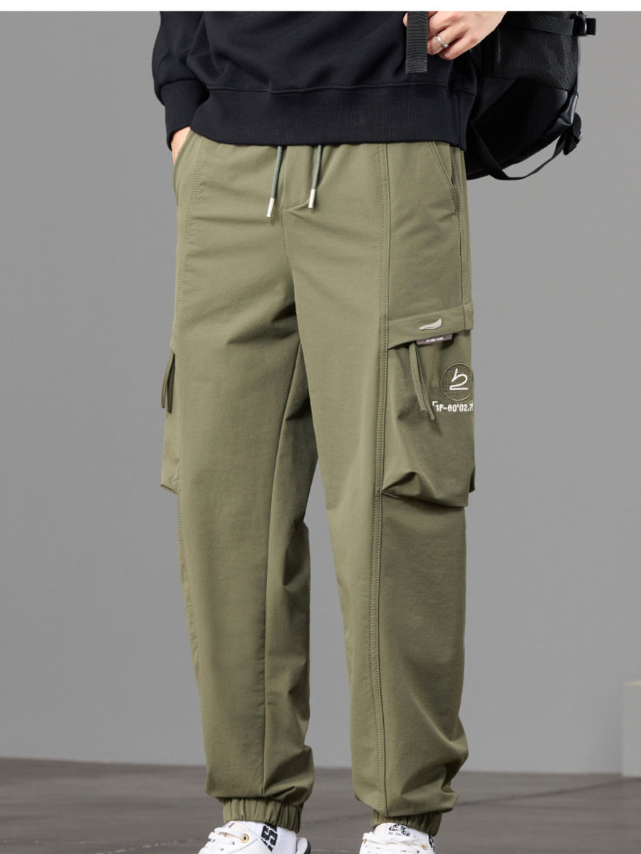 95%polyester,5%spandex Care instructions: Machine wash cold joggers in tan with tapered silhouette