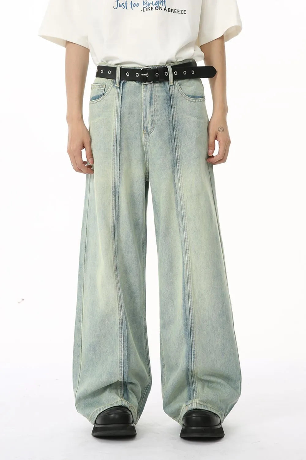 Light wash seamed palazzo denim trousers with a wide leg and casual styling.