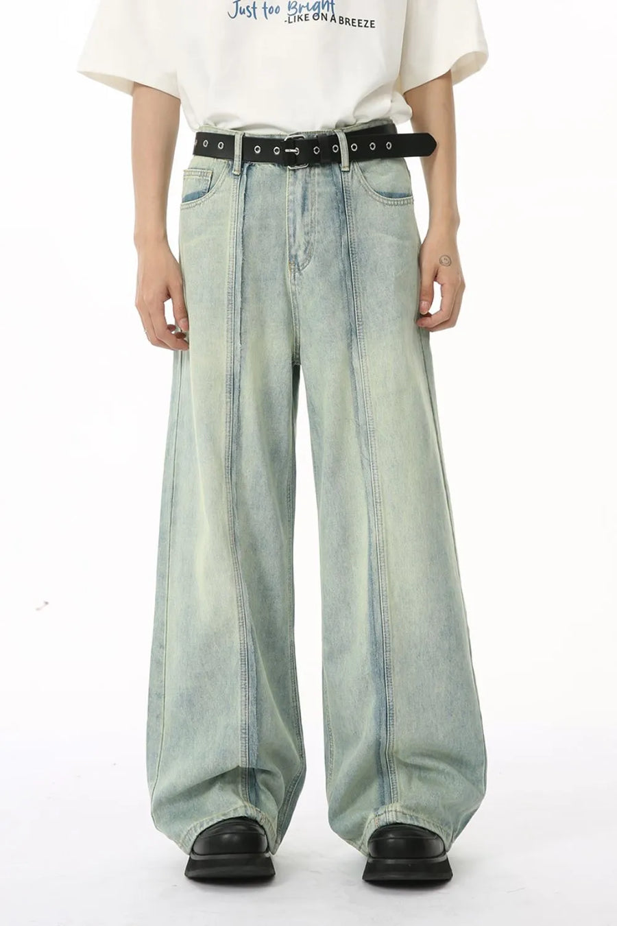 Light wash seamed palazzo denim trousers with a wide leg and casual styling.