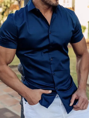 Men's dark blue slim fit short sleeve button-down shirt with a smooth finish.