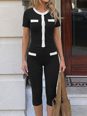 100% viscose Care instructions: Machine wash cold lounge set in black with fitted silhouette