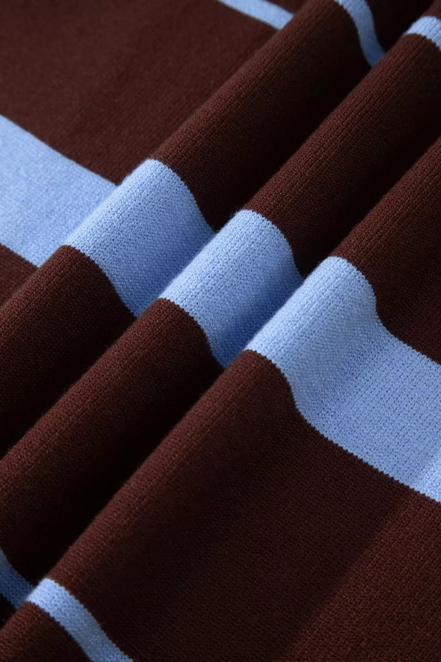 Chic striped knit sweater in brown and light blue with ribbed details.