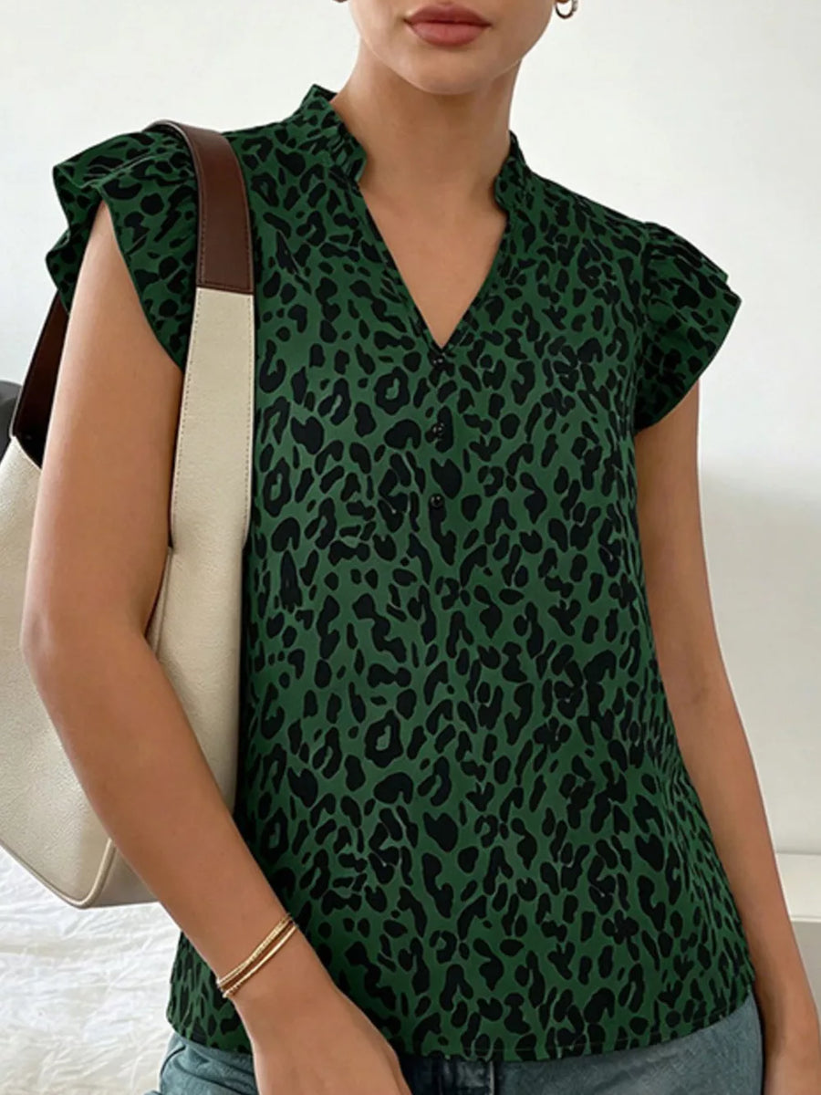 Green leopard print v-neck top with ruffle sleeves and a mock neck.