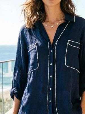 Navy linen button-up shirt with white piping and chest pockets.