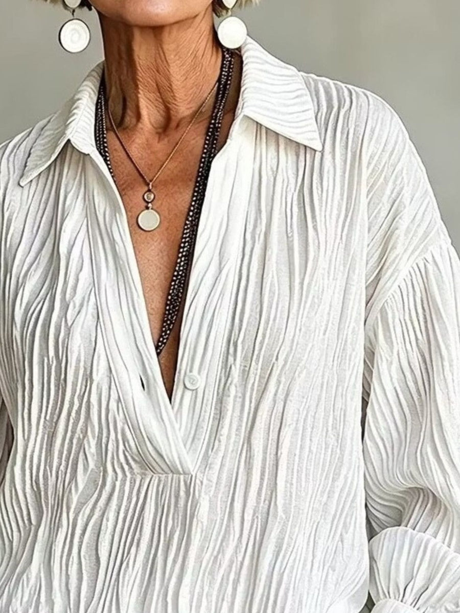 Black blouse with hip-length and half-button
