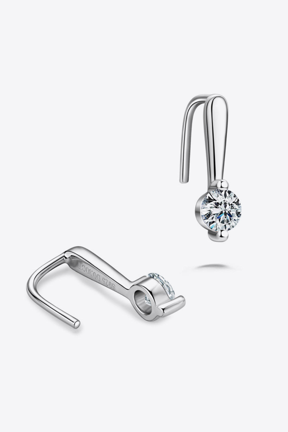 Silver moissanite hook earrings with minimalist sparkle and a single round-cut stone.