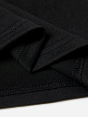Black t-shirt with visible stitching detail on hem and seams