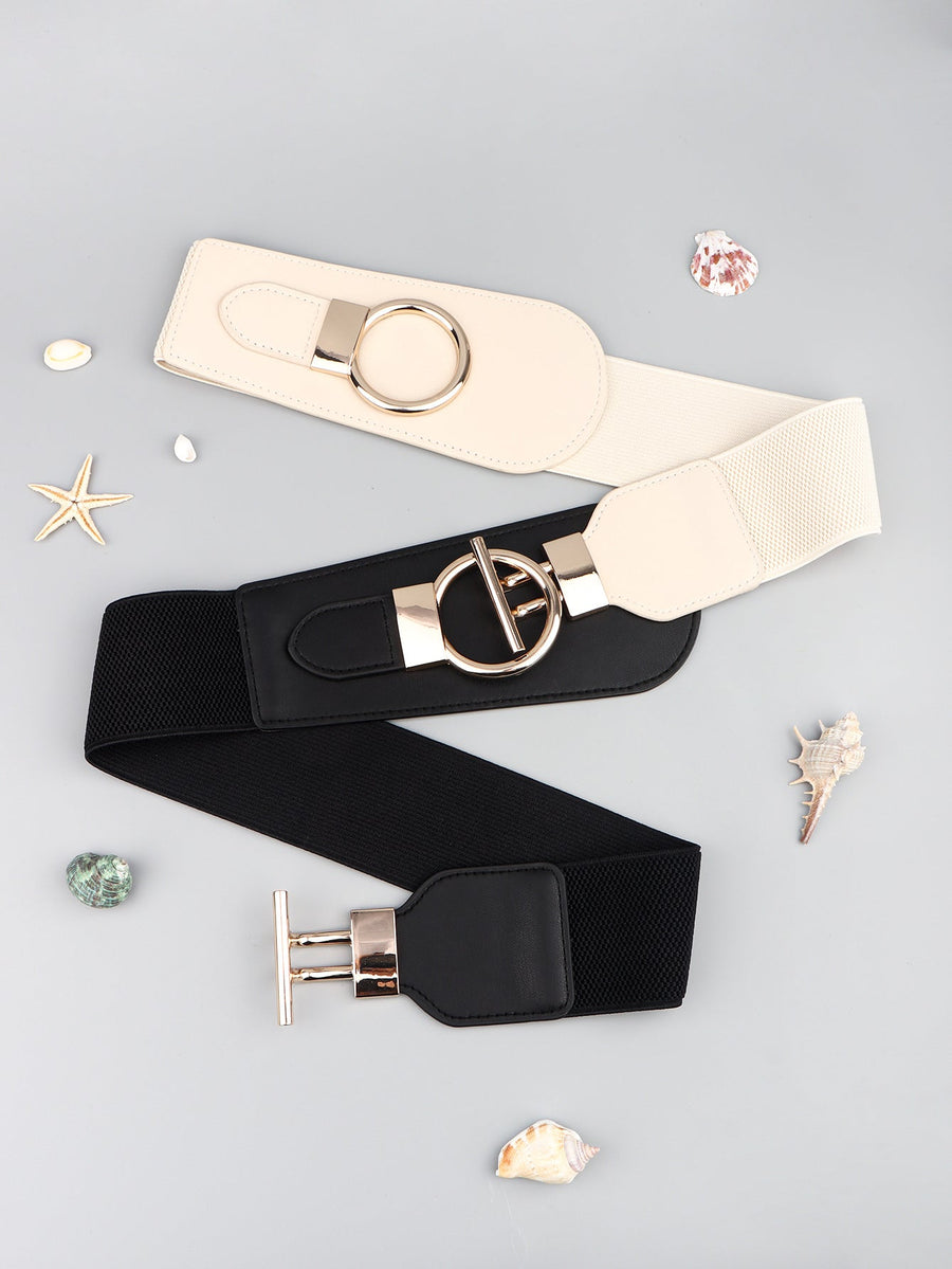 Black and cream elastic belts with gold hardware buckles and closures