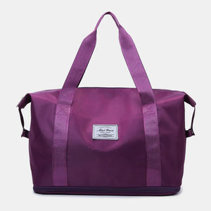 Plum purple nylon tote bag with dual straps and a central label.