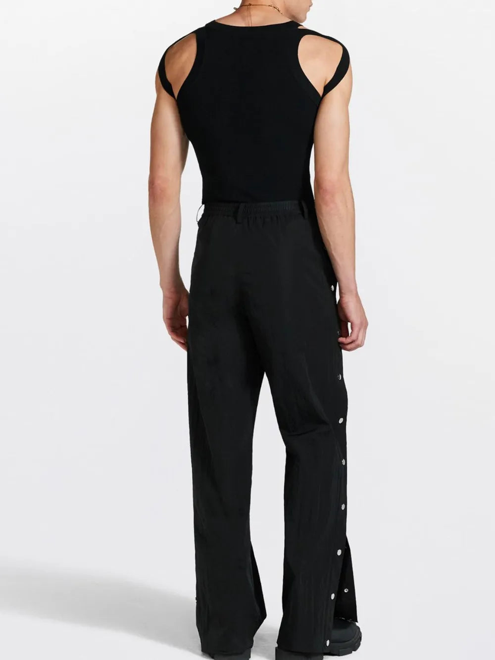 Black tank top with sculpted shoulder straps and a crew neck.