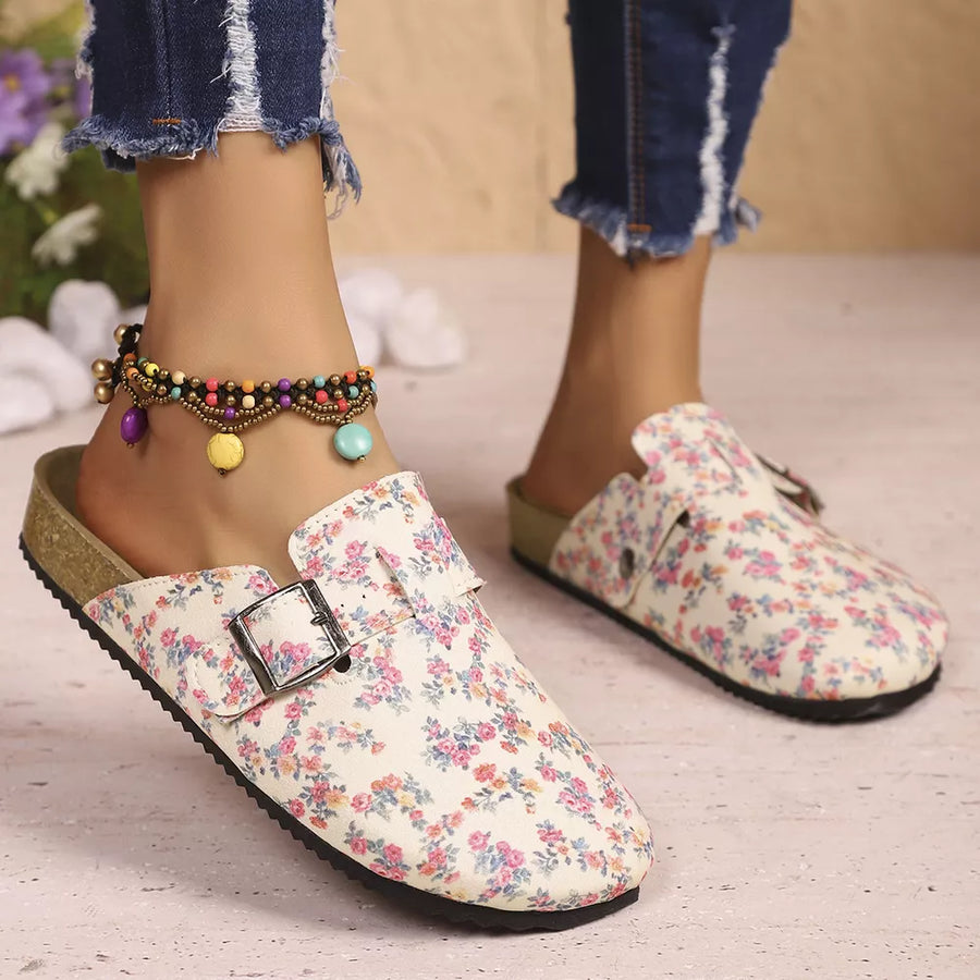 Floral print slip-on flats with decorative buckle detail and cork sole