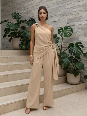 two-piece set in light beige featuring tied waist and relaxed fit