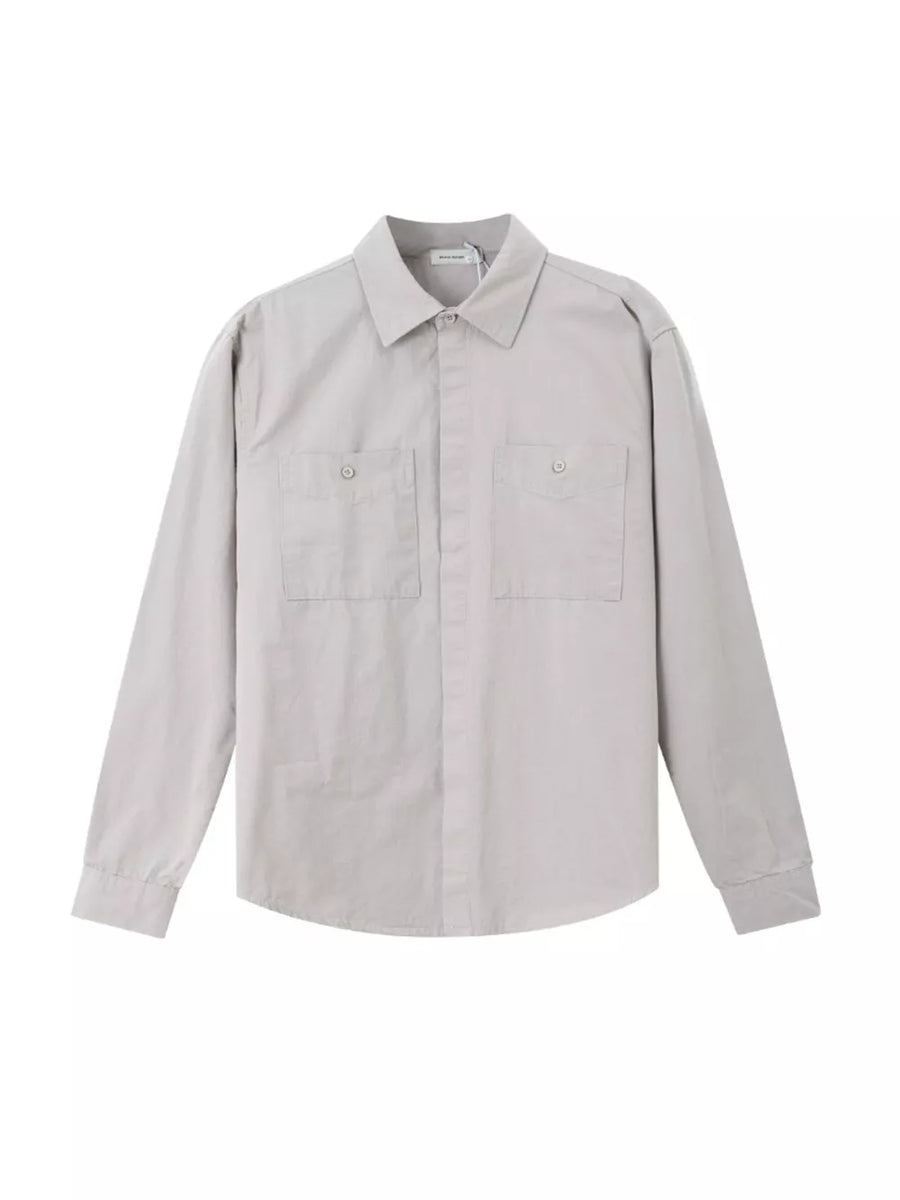 Light gray cotton button-down shirt with two chest pockets and long sleeves.