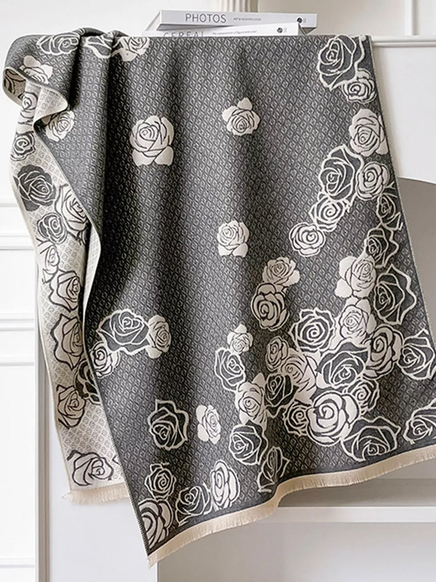 Gray scarf with an elegant floral rose pattern and diamond texture.