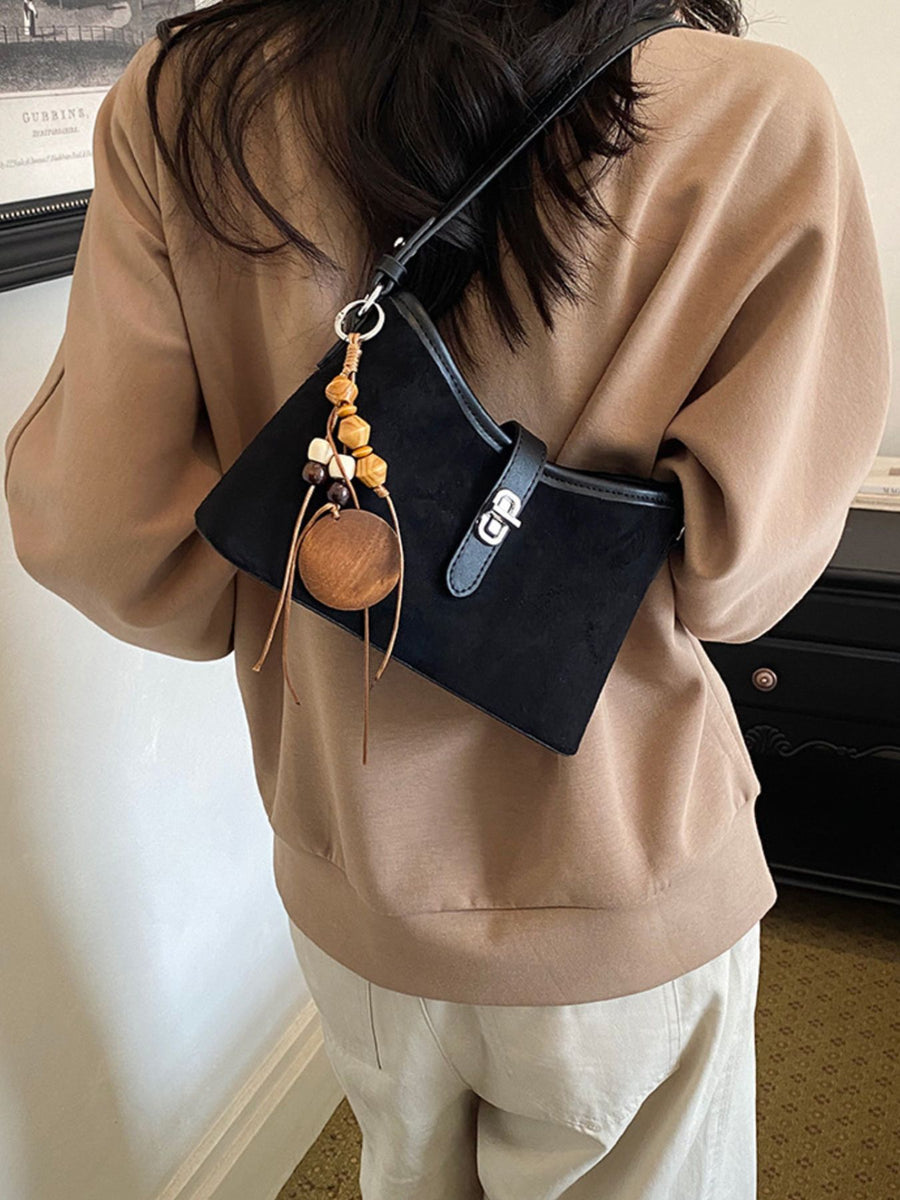 black with handbag with buckle detail