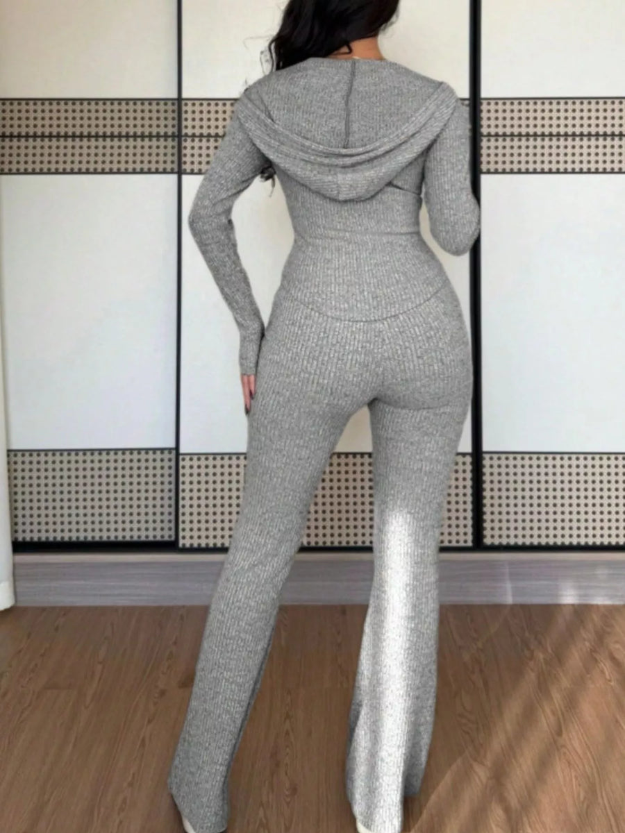 Light gray ribbed knit zip-up hooded set with flared pants.