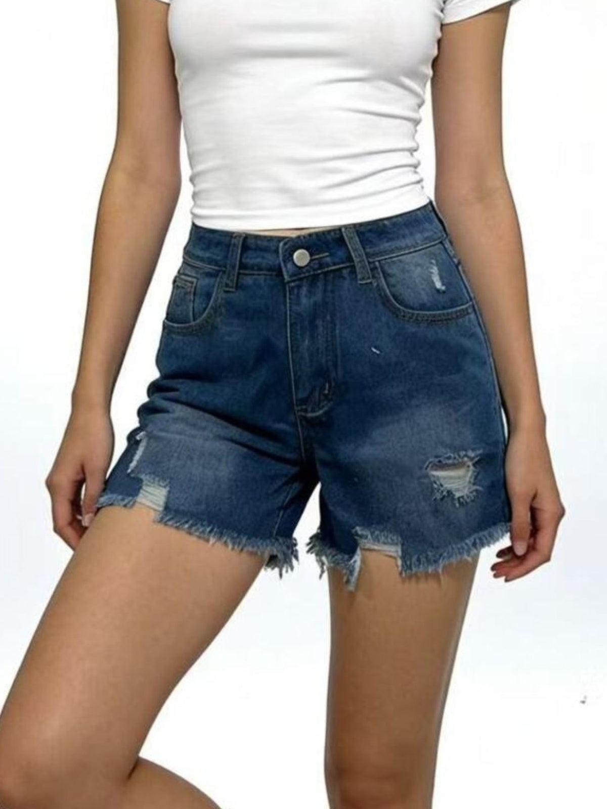 Dark blue denim shorts with distressed rips and frayed hem