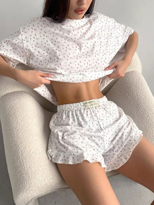 Blue pajama set featuring ruffled and ditsy floral