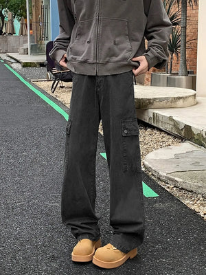 Gray loose fit cargo pants with multiple pockets and a relaxed cut.