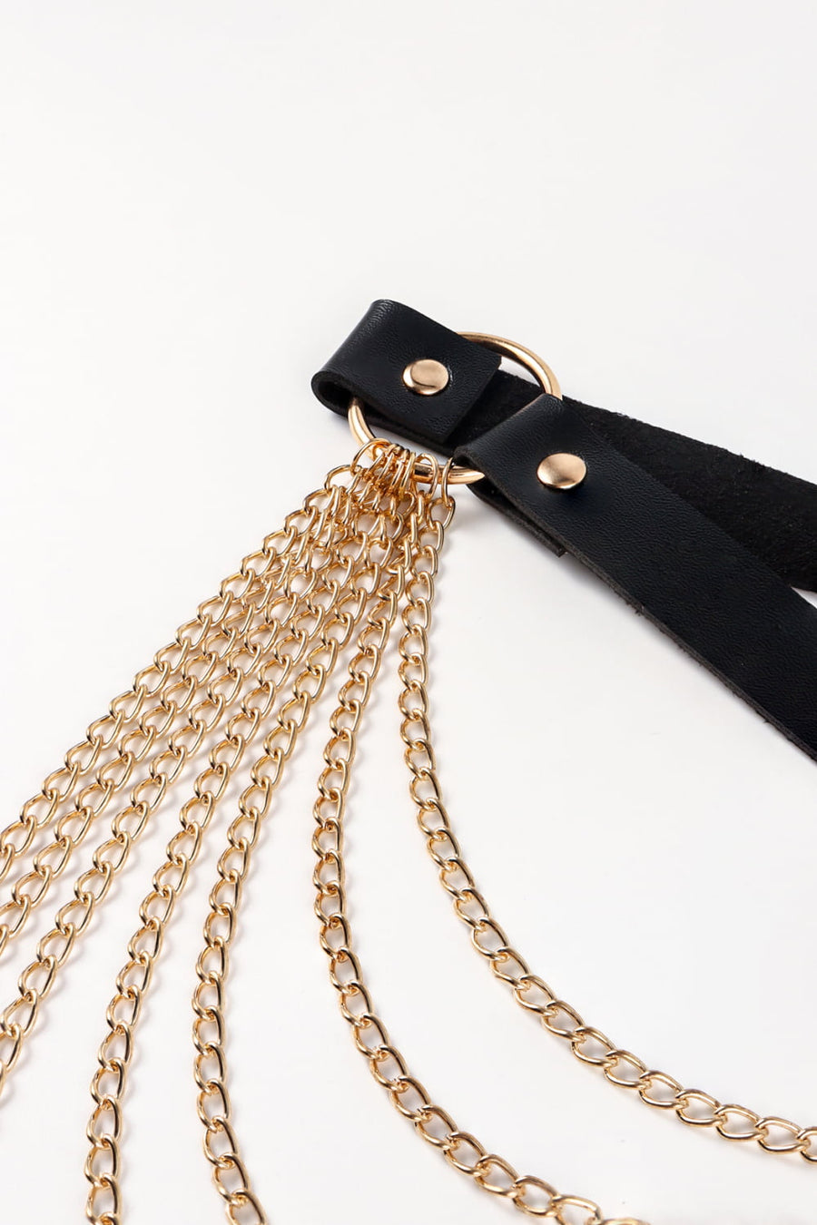 Black leather waist harness with cascading gold chains and gold hardware.