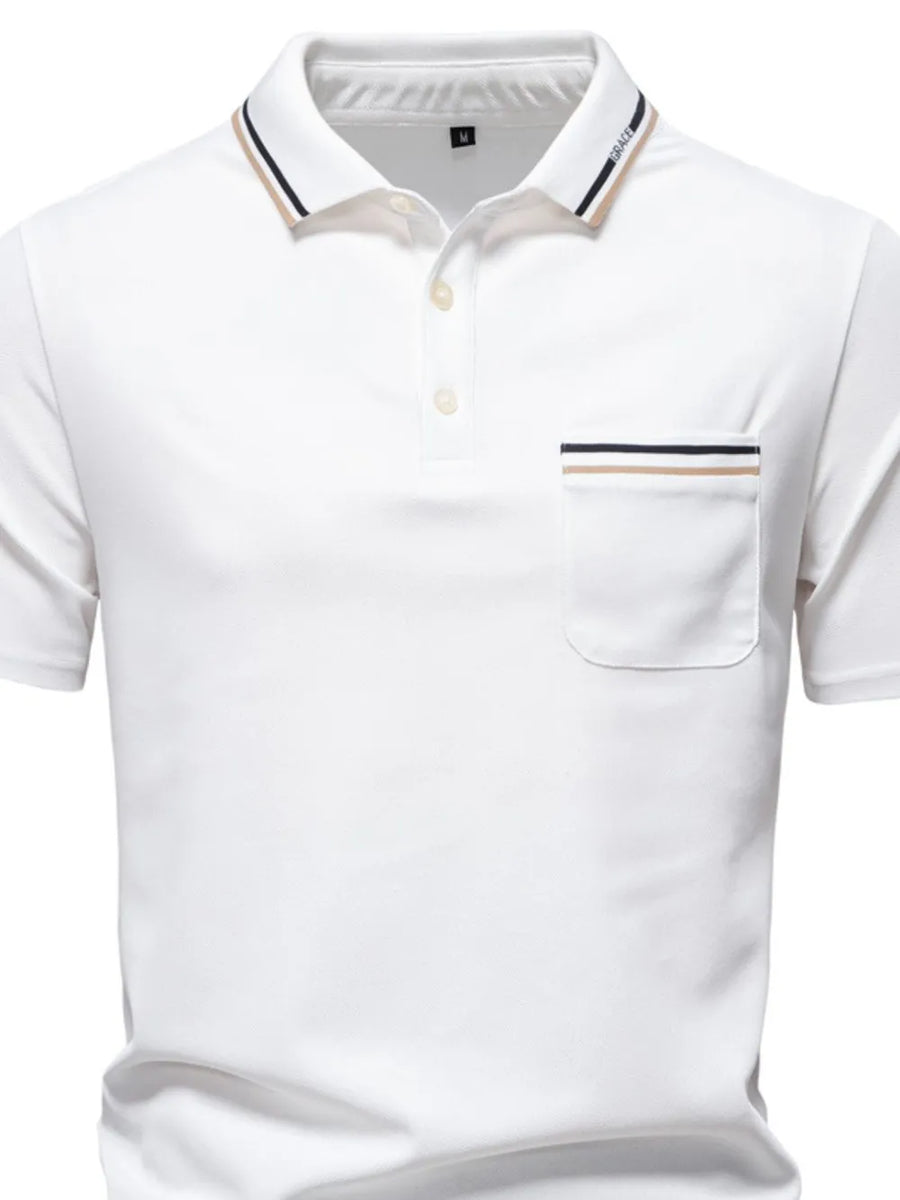 White polo shirt with textured fabric, contrast trim on collar and chest pocket.