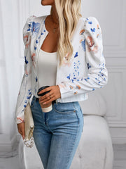 White floral puff sleeve cropped zip jacket with a bomber style.