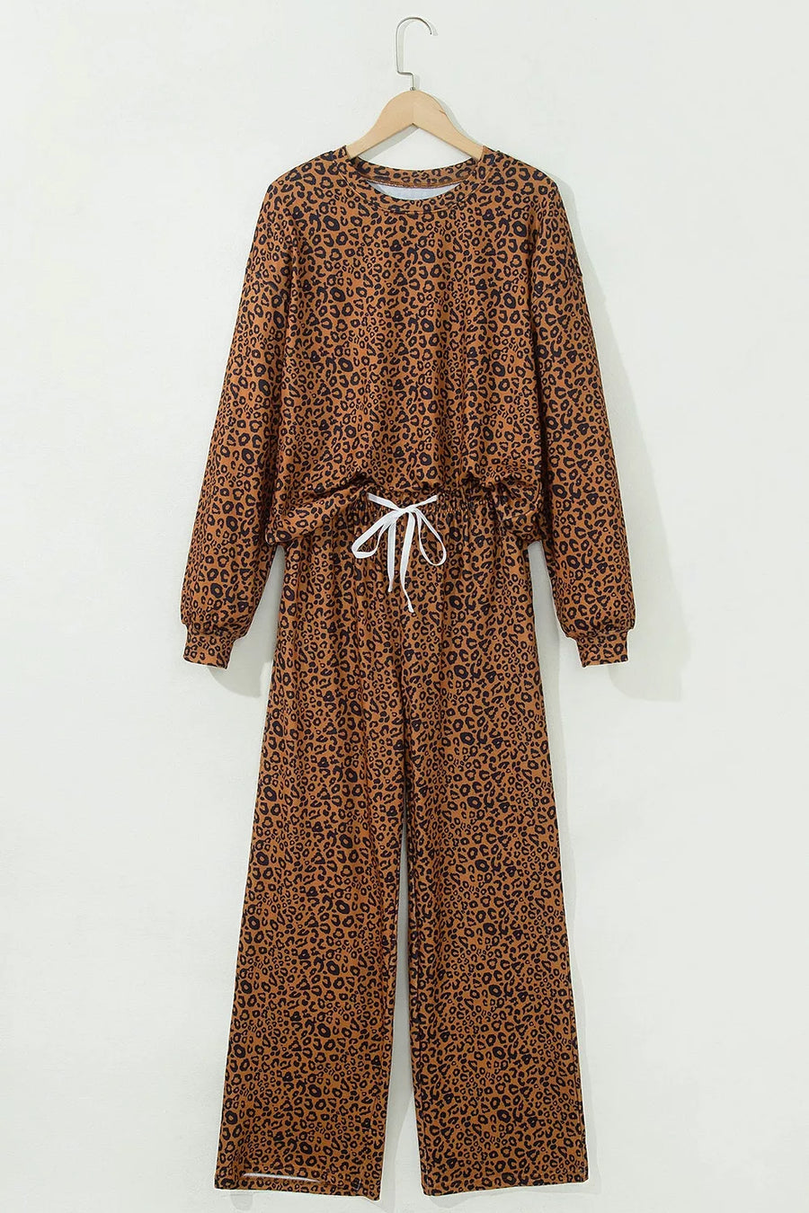 95% polyester, 5% elastane Care instructions: Machine wash cold pajama set in Brown with relaxed silhouette