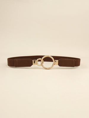 Chocolate elastic belt with interlocked gold rings and faux leather ends.