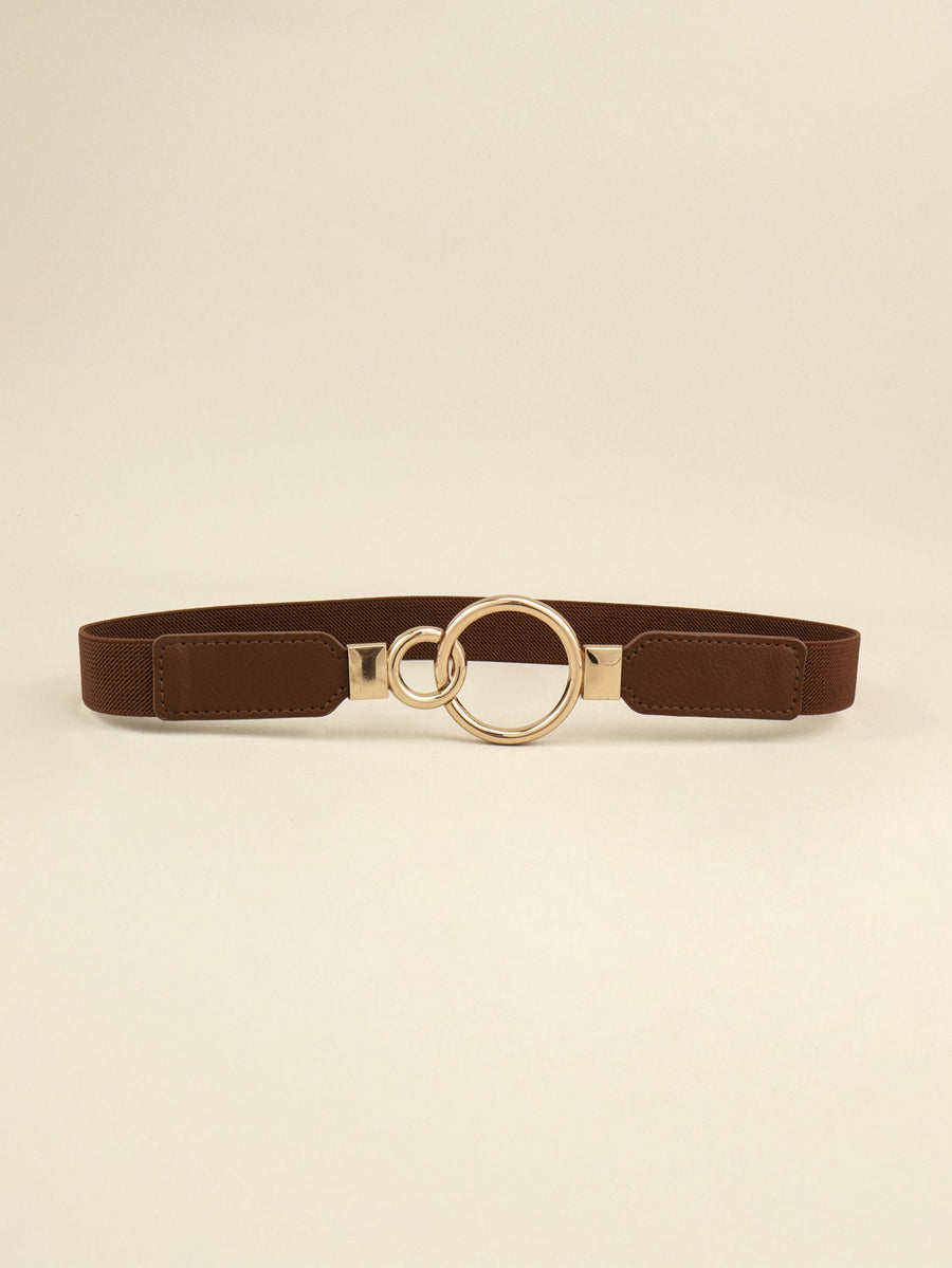 Chocolate elastic belt with interlocked gold rings and faux leather ends.