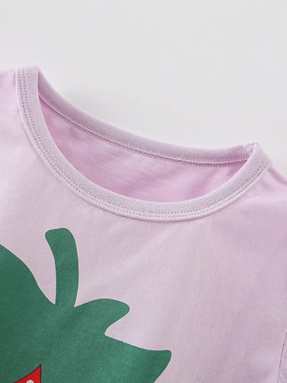 Girls' pink cotton undershirt with strawberry graphic and crew neck.