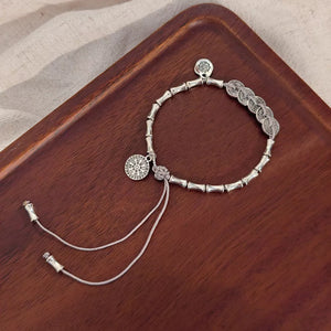 Silver bracelet featuring adjustable and geometric