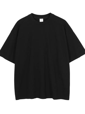 Black oversized washed cotton tee with short sleeves and crew neck.
