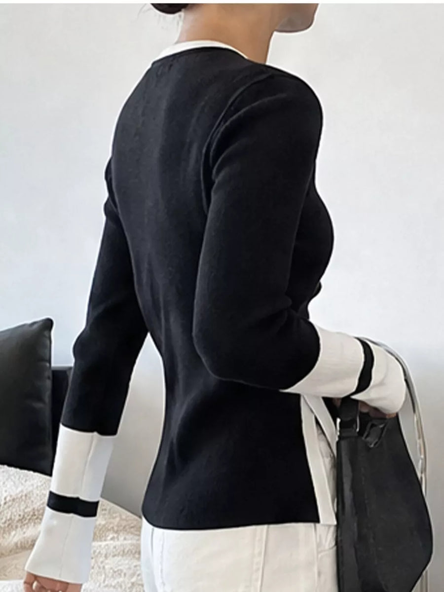 pullover sweater in black with striped and ribbed